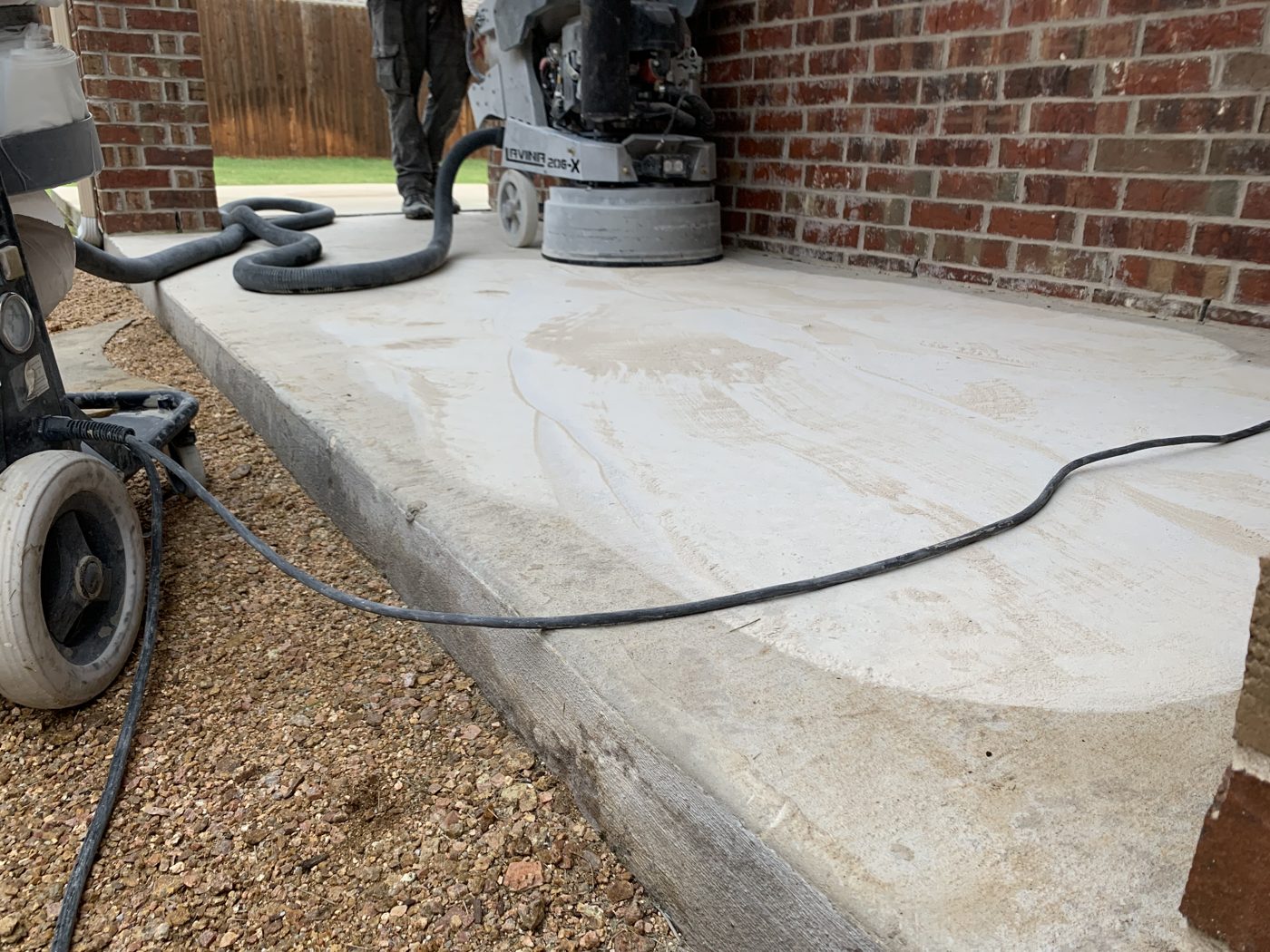 Grinding a patio slab before coating